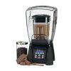 waring mx1500xtxp beverage blender with sound enclosure filled with drink